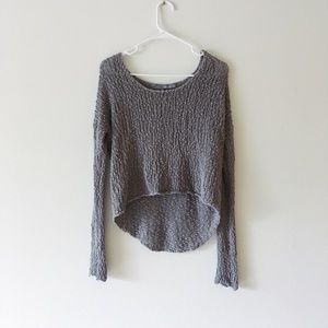 Slouchy grey open knit sweater.